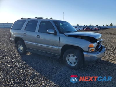 Czwarte zdjęcie samochodu z boku: 2000 GMC YUKON VIN:1GKEK13T9YJ126671 - miniatura