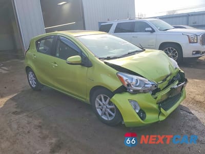 Czwarte zdjęcie samochodu z boku: 2016 TOYOTA PRIUS C FOUR VIN:JTDKDTB33G1133846 - miniatura