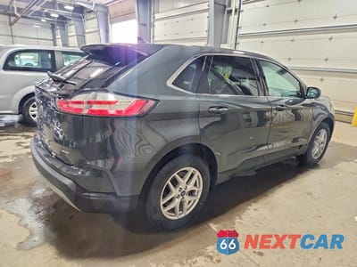 Trzecie zdjęcie samochodu z tyłu: 2021 FORD EDGE SEL VIN:2FMPK4J93MBA64000 - miniatura