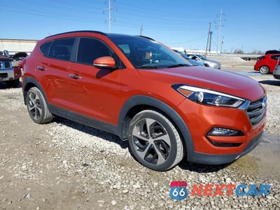 Czwarte zdjęcie samochodu z boku: 2016 HYUNDAI TUCSON LIMITED VIN:KM8J33A27GU163305 - miniatura