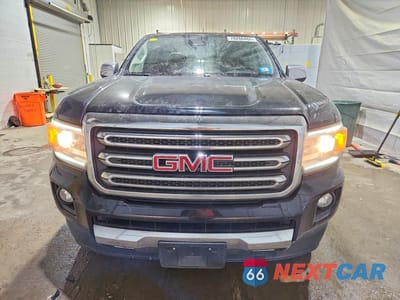 Piąte zdjęcie samochodu w środku: 2017 GMC CANYON SLT VIN:1GTG6DEN4H1322333 - miniatura