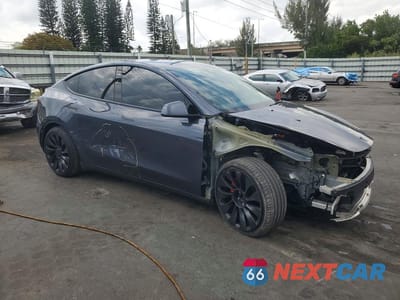 Czwarte zdjęcie samochodu z boku: 2022 TESLA MODEL Y VIN:7SAYGDEF5NF379673 - miniatura