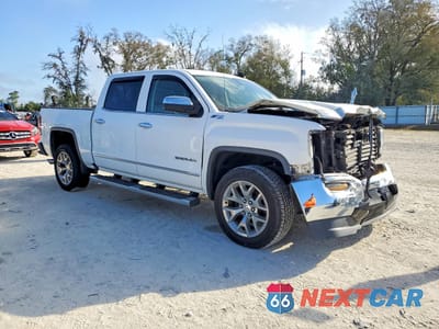 Czwarte zdjęcie samochodu z boku: 2018 GMC SIERRA K1500 SLT VIN:3GTU2NEC7JG614195 - miniatura
