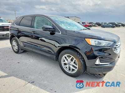 Czwarte zdjęcie samochodu z boku: 2021 FORD EDGE SEL VIN:2FMPK3J96MBA26397 - miniatura