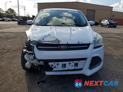 Piąte zdjęcie samochodu w środku: 2016 FORD ESCAPE SE VIN:1FMCU0GXXGUC61574 - miniatura