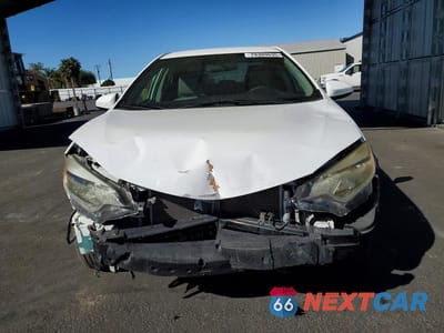 Piąte zdjęcie samochodu w środku: 2016 TOYOTA COROLLA LE VIN:5YFBURHEXGP445881 - miniatura