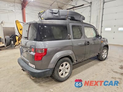 Trzecie zdjęcie samochodu z tyłu: 2010 HONDA ELEMENT EX VIN:5J6YH2H74AL001056 - miniatura