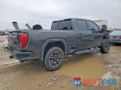 Trzecie zdjęcie samochodu z tyłu: 2020 GMC SIERRA K2500 AT4 VIN:1GT49PE71LF246403 - miniatura
