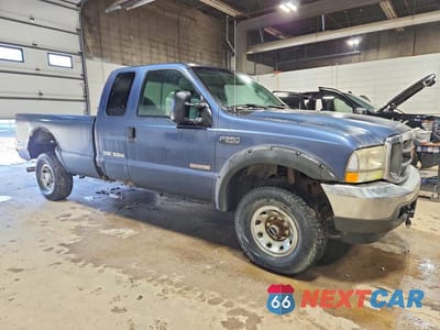 Czwarte zdjęcie samochodu z boku: 2004 FORD F250 SUPER DUTY VIN:1FTNX21P44EB49352 - miniatura