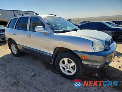 Czwarte zdjęcie samochodu z boku: 2002 HYUNDAI SANTA FE GLS VIN:KM8SC73D72U243965 - miniatura