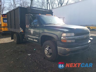 Czwarte zdjęcie samochodu z boku: 2002 CHEVROLET SILVERADO CHIPPER TRUCK VIN:1GBJK34U32E207912 - miniatura