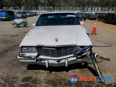 Piąte zdjęcie samochodu w środku: 1993 CADILLAC DEVILLE VIN:1G6CD53B7P4326427 - miniatura