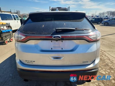 Zdjęcie 6 z 14 samochodu: 2016 FORD EDGE SE VIN:2FMPK3G98GBC51495 - miniatura