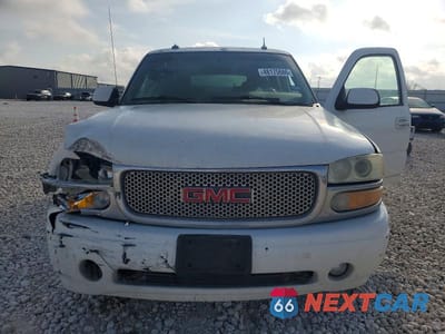 Zdjęcie 12 z 13 samochodu: 2003 GMC YUKON XL DENALI VIN:1GKFK66U23J150972 - miniatura