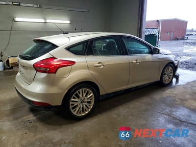 Trzecie zdjęcie samochodu z tyłu: 2018 FORD FOCUS TITANIUM VIN:1FADP3N27JL232609 - miniatura