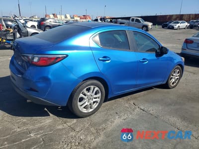 Trzecie zdjęcie samochodu z tyłu: 2016 SCION IA BASE VIN:3MYDLBZV1GY129126 - miniatura