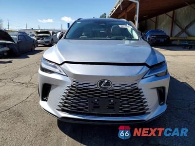 Piąte zdjęcie samochodu w środku: 2026 LEXUS RX 450H+ LUXURY VIN:JTJCJMGA5T2038409 - miniatura