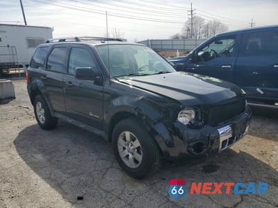 Czwarte zdjęcie samochodu z boku: 2011 FORD ESCAPE HYBRID VIN:1FMCU4K36BKA68127 - miniatura