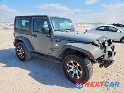 Czwarte zdjęcie samochodu z boku: 2015 JEEP WRANGLER SPORT VIN:1C4GJWAG1FL663207 - miniatura