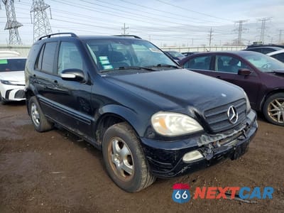 Czwarte zdjęcie samochodu z boku: 2003 MERCEDES-BENZ ML 320 VIN:4JGAB54E33A384092 - miniatura