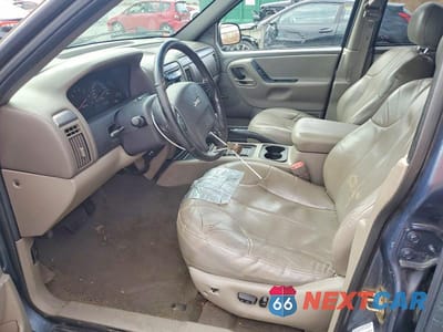 Zdjęcie 7 z 13 samochodu: 2001 JEEP GRAND CHEROKEE LAREDO VIN:1J4GW48S31C540513 - miniatura