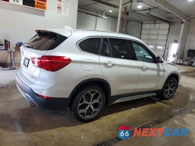 Trzecie zdjęcie samochodu z tyłu: 2018 BMW X1 XDRIVE28I VIN:WBXHT3C34J3H30064 - miniatura