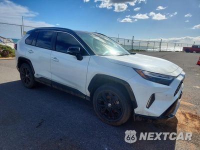 Czwarte zdjęcie samochodu z boku: 2022 TOYOTA RAV4 HYBRID XSE VIN:JTME6RFV7NJ023062 - miniatura