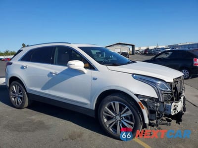 Czwarte zdjęcie samochodu z boku: 2021 CADILLAC XT5 PREMIUM LUXURY VIN:1GYKNCRS4MZ232922 - miniatura
