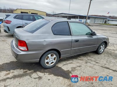 Trzecie zdjęcie samochodu z tyłu: 2002 HYUNDAI ACCENT GS VIN:KMHCG35C92U219849 - miniatura