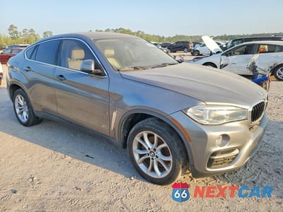 Czwarte zdjęcie samochodu z boku: 2015 BMW X6 XDRIVE35I VIN:5UXKU2C5XF0N77450 - miniatura