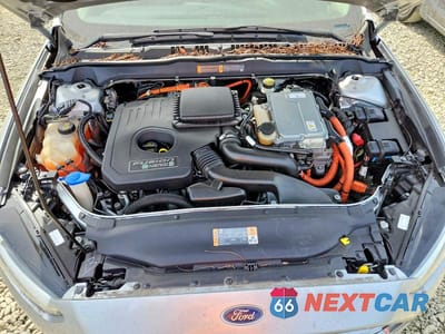 Zdjęcie 11 z 11 samochodu: 2014 FORD FUSION SE PHEV VIN:3FA6P0PU8ER307007 - miniatura