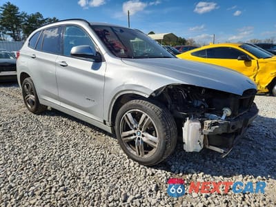 Czwarte zdjęcie samochodu z boku: 2017 BMW X1 SDRIVE28I VIN:WBXHU7C31H5H36455 - miniatura