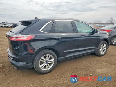 Trzecie zdjęcie samochodu z tyłu: 2020 FORD EDGE SEL VIN:2FMPK3J96LBA76778 - miniatura