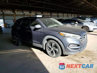 Czwarte zdjęcie samochodu z boku: 2016 HYUNDAI TUCSON LIMITED VIN:KM8J33A25GU093416 - miniatura