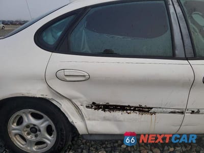 Zdjęcie 10 z 11 samochodu: 1997 FORD TAURUS GL VIN:1FALP52U0VA272156 - miniatura