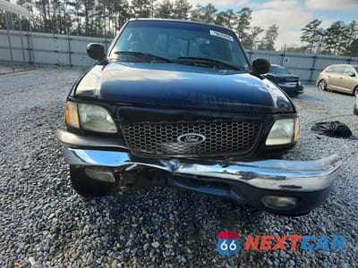 Piąte zdjęcie samochodu w środku: 2002 FORD F150 VIN:1FTRX18L72NB17510 - miniatura