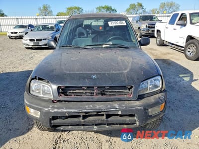 Piąte zdjęcie samochodu w środku: 2000 TOYOTA RAV4 BASE VIN:JT3GP10V3Y0051035 - miniatura