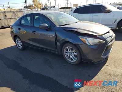 Czwarte zdjęcie samochodu z boku: 2016 SCION IA BASE VIN:3MYDLBZV7GY136727 - miniatura