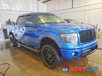 Czwarte zdjęcie samochodu z boku: 2014 FORD F150 SUPERCREW VIN:1FTFW1EF4EKD13530 - miniatura