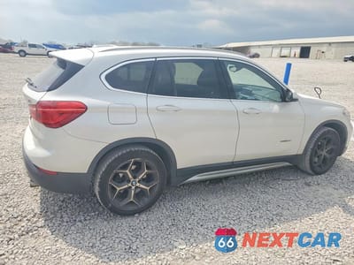 Trzecie zdjęcie samochodu z tyłu: 2017 BMW X1 SDRIVE28I VIN:WBXHU7C36H5H38704 - miniatura