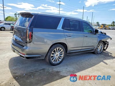 Trzecie zdjęcie samochodu z tyłu: 2022 CADILLAC ESCALADE PREMIUM LUXURY VIN:1GYS4CKL7NR155695 - miniatura