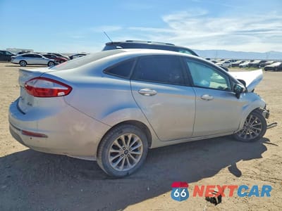 Trzecie zdjęcie samochodu z tyłu: 2014 FORD FIESTA SE VIN:3FADP4BJXEM191723 - miniatura