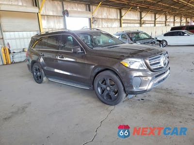 Czwarte zdjęcie samochodu z boku: 2017 MERCEDES-BENZ GLS 450 4MATIC VIN:4JGDF6EE7HA815983 - miniatura