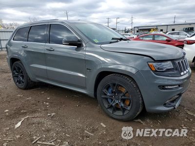 Czwarte zdjęcie samochodu z boku: 2014 JEEP GRAND CHEROKEE SRT-8 VIN:1C4RJFDJ3EC226646 - miniatura