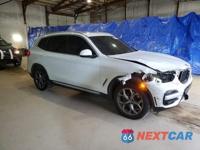 Czwarte zdjęcie samochodu z boku: 2021 BMW X3 XDRIVE30I VIN:5UXTY5C06M9F13030 - miniatura