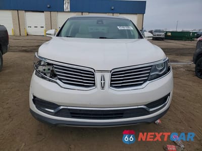 Piąte zdjęcie samochodu w środku: 2016 LINCOLN MKX RESERVE VIN:2LMTJ8LP7GBL50090 - miniatura