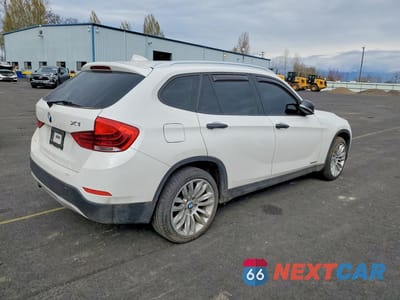 Trzecie zdjęcie samochodu z tyłu: 2013 BMW X1 XDRIVE28I VIN:WBAVL1C50DVR82919 - miniatura