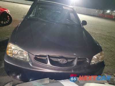 Piąte zdjęcie samochodu w środku: 2002 HYUNDAI ACCENT VIN:KMHCG35C12U213978 - miniatura