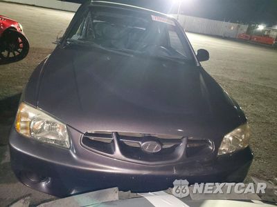 Piąte zdjęcie samochodu w środku: 2002 HYUNDAI ACCENT VIN:KMHCG35C12U213978 - miniatura