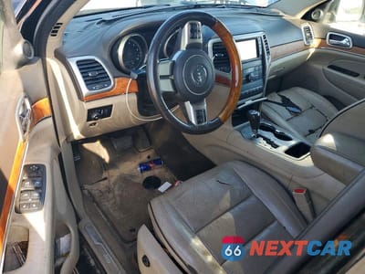 Zdjęcie 8 z 13 samochodu: 2013 JEEP GRAND CHEROKEE OVERLAND VIN:1C4RJECG9DC526108 - miniatura